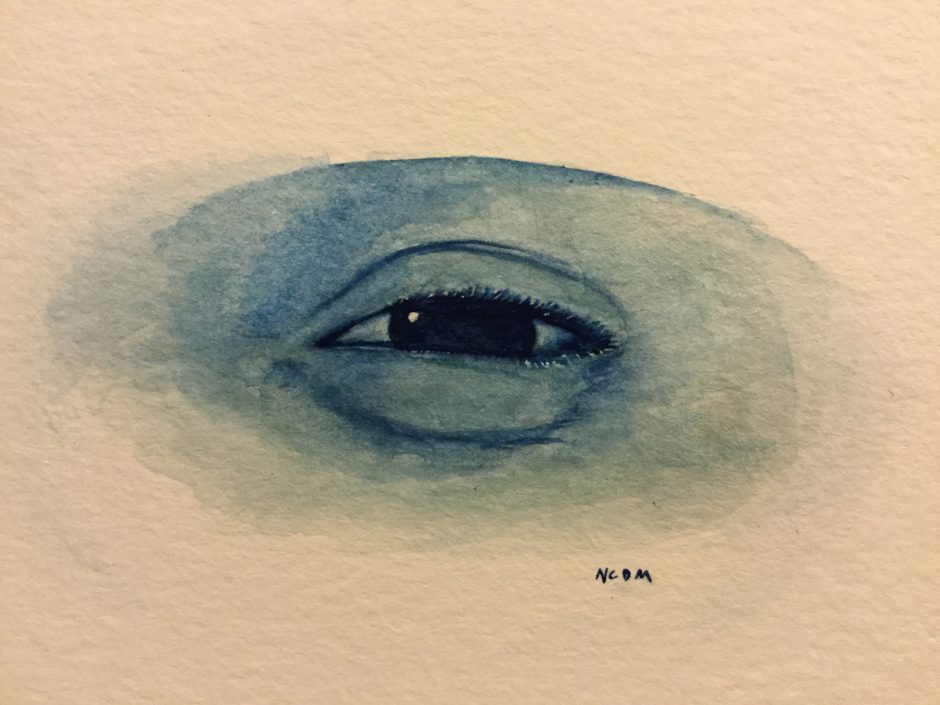 A blue watercolor painting of an eye squinting into the sun. There are small flecks of white paint where the eyelashes are glinting with sunlight.