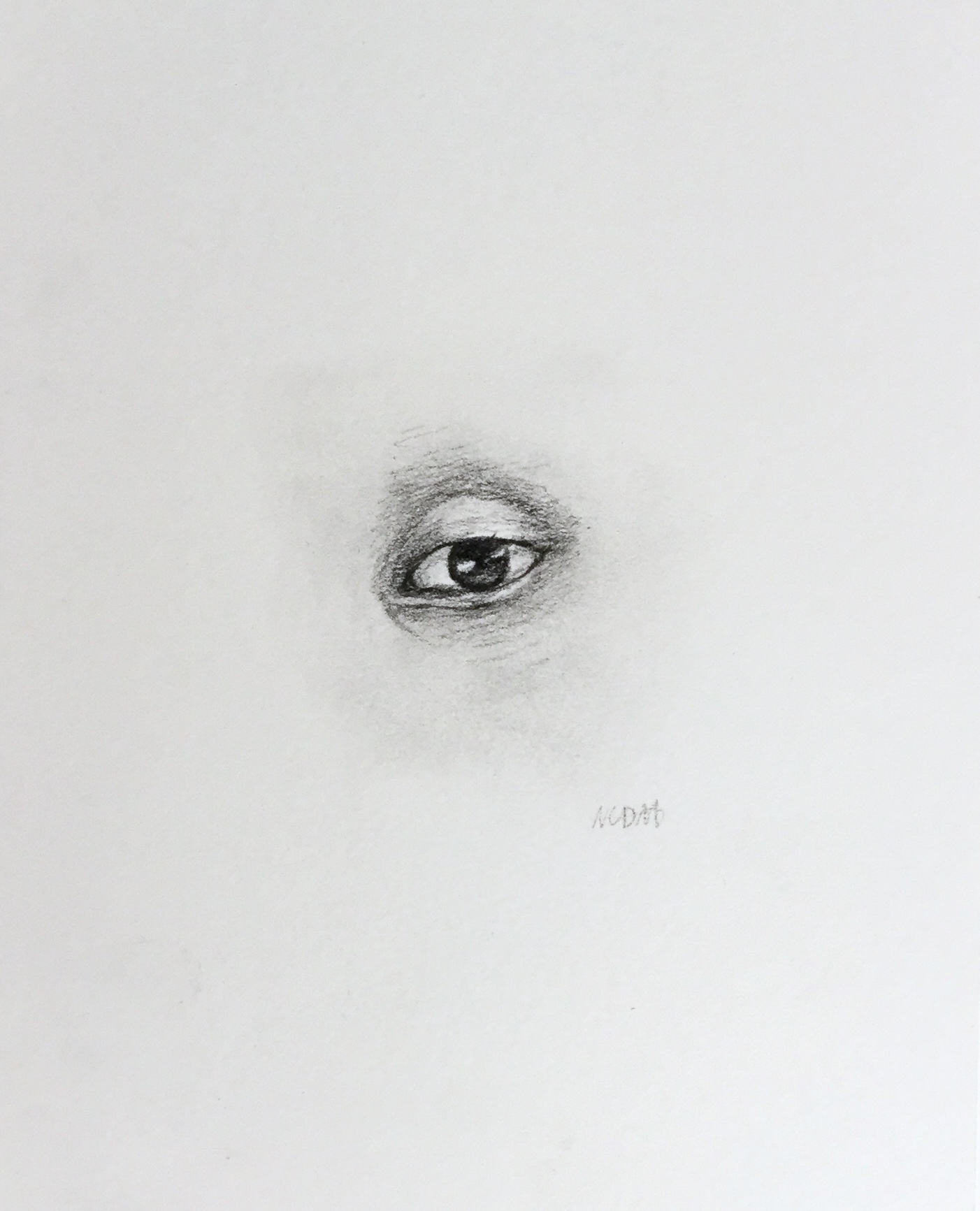 Tiny charcoal drawing drawing of an eye