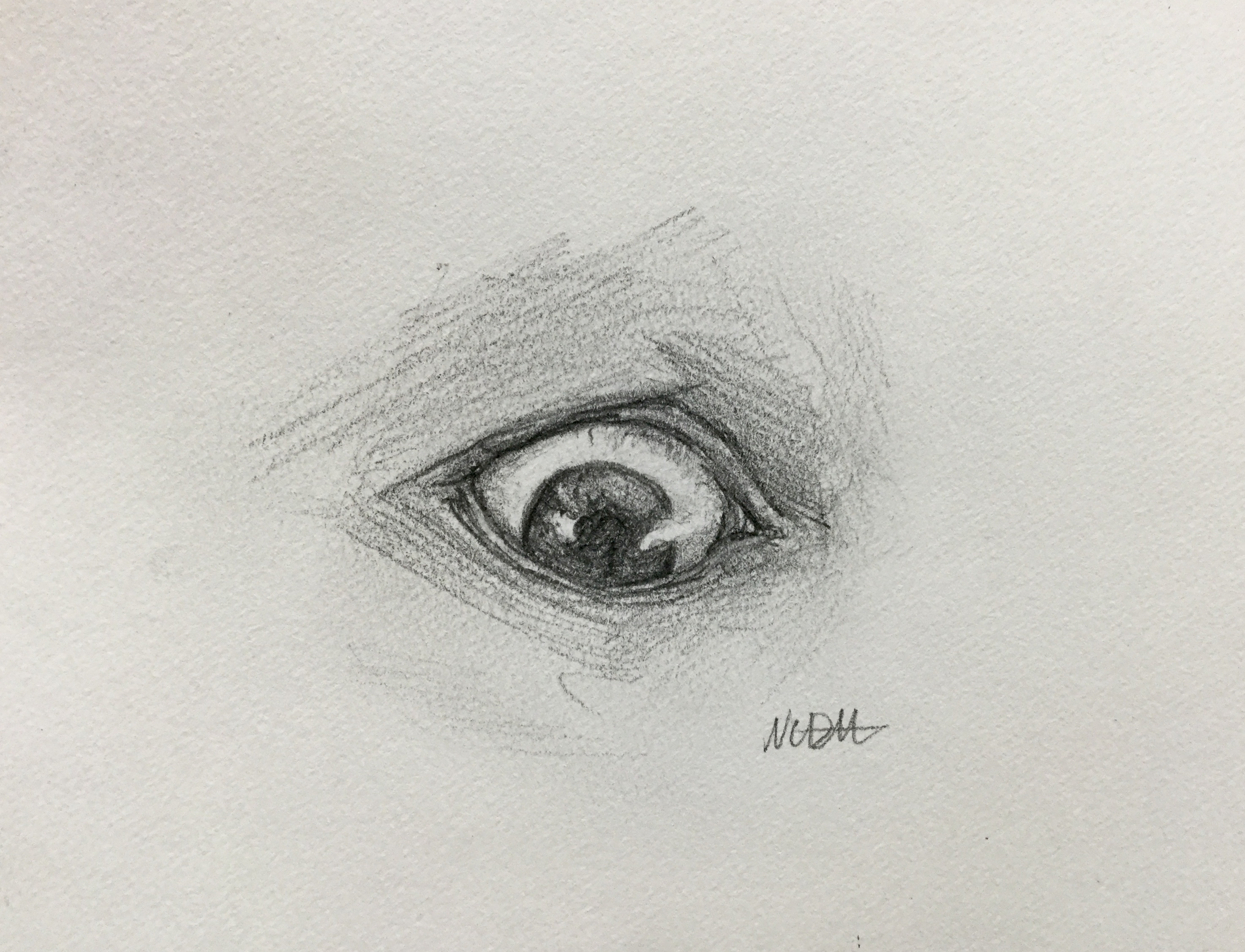Graphite drawing of an eye in the center of the page looking down in a startled expression